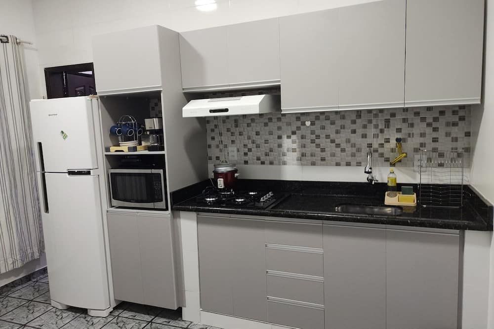 Apartamentos Aconchegante Aki - קאקואל - מטבח