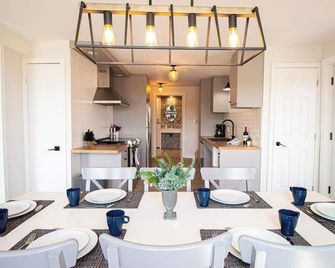 Les Chalets Tourisma - La Voisine - St-Raymond - Comedor