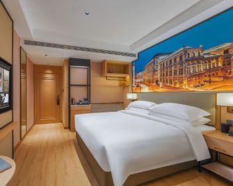 Vienna International Hotel Xuzhou Tongshan Wanda Plaza Yuquanhe Metro Station - Xuzhou - Bedroom