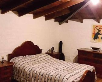 Beautiful top floor apartment with a fantastic view of the volcano Cayambe - Quito - Habitación