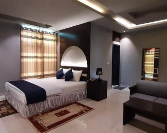 D'more Sreemangal Hotel & Resort - Srimangal - Habitación