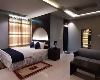 D'more Sreemangal Hotel & Resort - Srimangal - Habitación