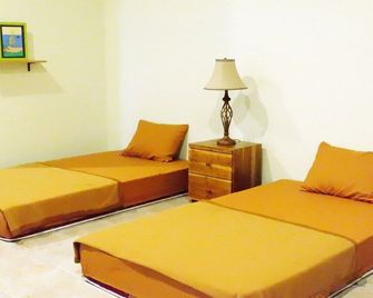 Besopok Hostel - Kuta - Wohnzimmer