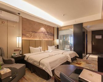 Longwan Hotel - Huanggang - Bedroom