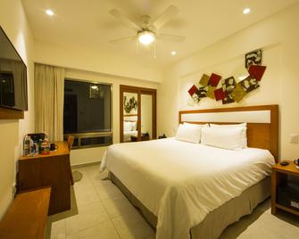 Ambiance Suites - Cancún - Kamar Tidur