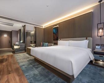 New Juntai Hotel - Taizhou - Slaapkamer