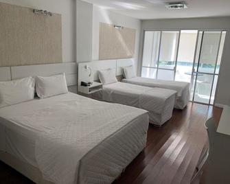 Emirates Hotel & Suites - Santana do Livramento - Schlafzimmer