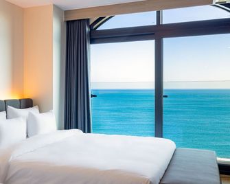 Hound Hotel Ulsan - Улсан - Спальня
