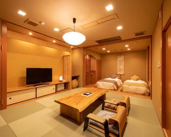 Yunohana Onsen Omotenashinoyado Keizankaku Hotel - Kameoka - Camera da letto