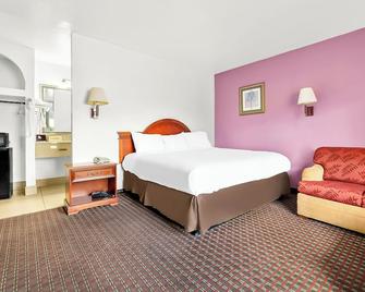 Capitol Inn And Suites - Montgomery - Schlafzimmer