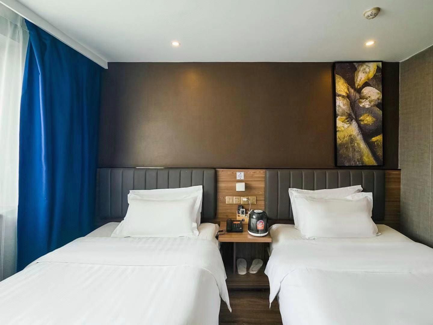 7Days Inn Tianjin Railway Station - تيانجين - غرفة نوم