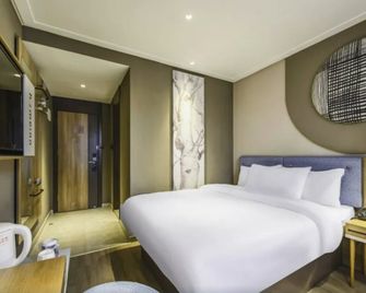 Home Inn Neo Kunming Beijing Road Dongfeng Plaza Metro Station - Kunming - Κρεβατοκάμαρα
