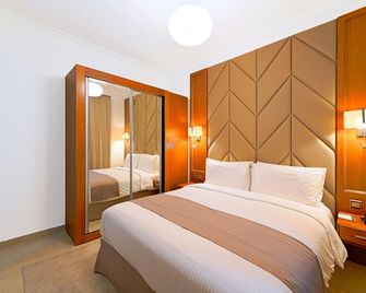Time Moonstone Hotel Apartments - Fujairah - Bedroom