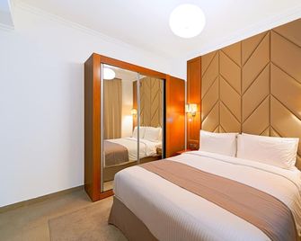 Time Moonstone Hotel Apartments - Fujairah - Bedroom