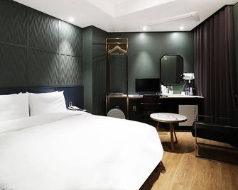 Jincheon Alma Business Hotel - Jincheon - Habitación