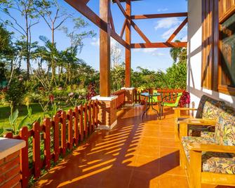 Large Home Set Into Lush Landscape with Private Pool & Gorgeous Deck Area - Grecia - Patio