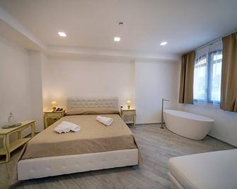 مينيسال فارم هاوس - كالاتابيانو - غرفة نوم