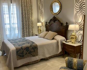 Hotel Europa Boutique Sevilla - Seville - Bedroom