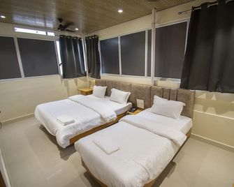 Hotel Anubhuti - Ujjain - Slaapkamer