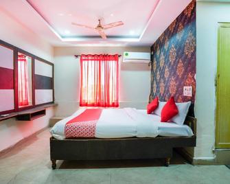 OYO Hotel Hyderabad Continental - Hajdarábád - Ložnice