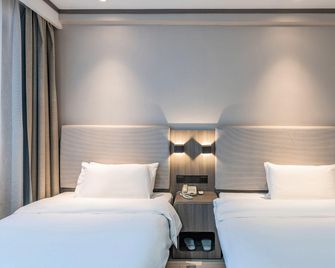 Hanting Express Changchun Renmin Square - Changchun - Quarto