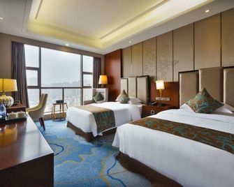 Nanchong Jin Hong Hotel - Nanchong - Bedroom