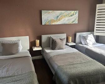 Days Inn Long Beach City Center - לונג ביץ' - חדר שינה