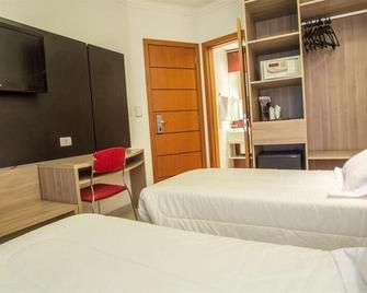 Atlântico Golden Apart Hotel - Santos - Habitación