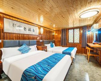 Long'an Inn - Hezhou - Bedroom