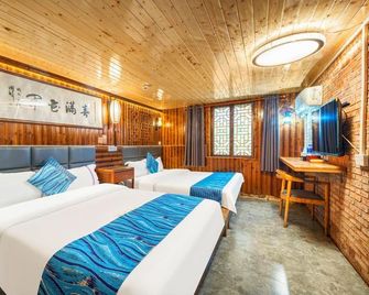 Long'an Inn - Hezhou - Bedroom