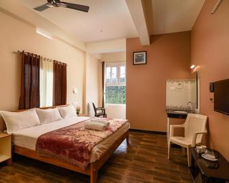 Maryland Homestay - Valparai - Bedroom