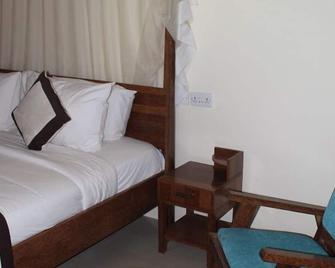 The Island Stone Town hotel - Jambiani - Schlafzimmer