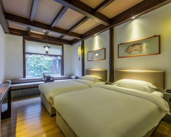 Taichi Hotel - Shiyan - Bedroom