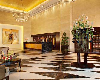 Joy Nostalg Hotel and Suites Manila Managed by The Ascott Limited - Pasig - Front desk