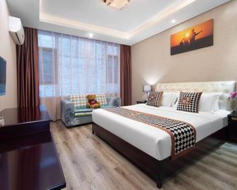 Mount Emei Happy Hotel - Leshan - Slaapkamer