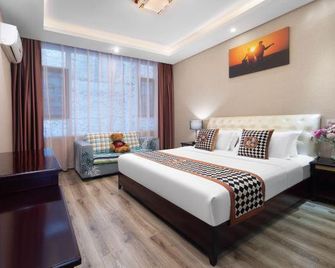 Mount Emei Happy Hotel - Leshan - Camera da letto