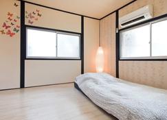 Entire house rental Osaka Namba Nara USJ transportation convenience ★ Discount sale price!No extra charge for charter!Two bicycles free! - 히가시오사카 - 침실