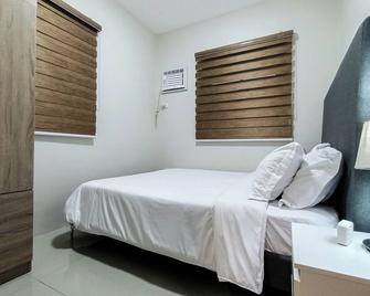 Manzil Anilao Cosy 1 bedroom Apt U7 - Batangas - Chambre