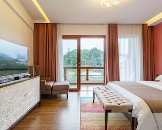 Z-up Boutique Hotel - Zhangjiajie - Habitación