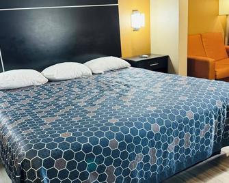Executive Inn & Suites - Floresville - Ložnice