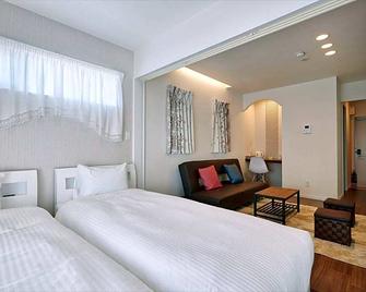 Condominium Yuyuki - Yomitan - Habitación