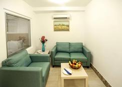 Khuttar Apartment - Amman - Obývací pokoj