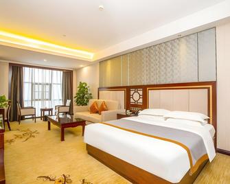 Loudi 418 Huatian Grand Hotel - Loudi - Bedroom