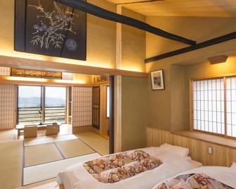 Kawabaonsen Kayabukinogensenyuyado yutorian - Numata - Slaapkamer