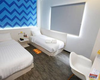 Summer Bed And Breakfast Hotel - Banjarmasin - Habitación
