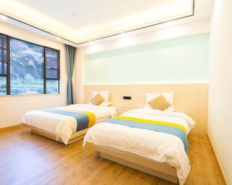 Lotusinn Apartment - Zhuhai - Schlafzimmer