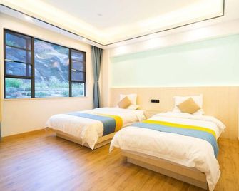 Lotusinn Apartment - Zhuhai - Yatak Odası