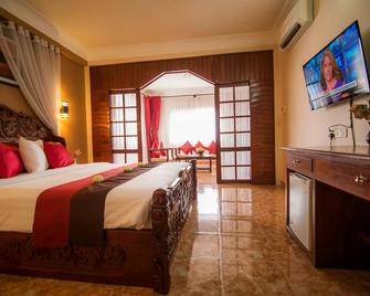 Reaksmey Chanreas Hotel - סיאם ריפ - חדר שינה