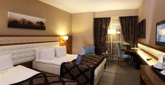 Revag Palace Hotel - Sivas - Schlafzimmer