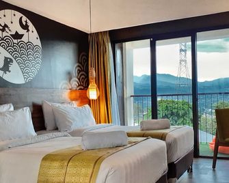 The Batu Hotel & Villas - Batu - Schlafzimmer